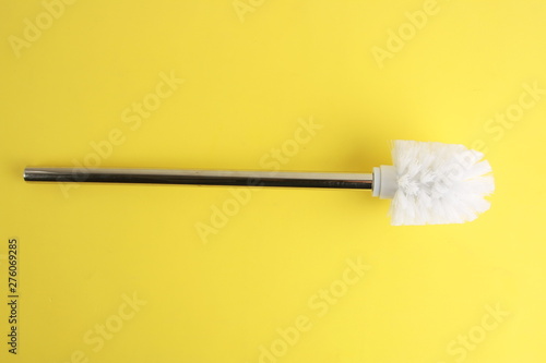 toilet brush in white and silver