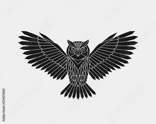 Geometric owl. Polygonal animal. Black silhouette. Vector illustration. 