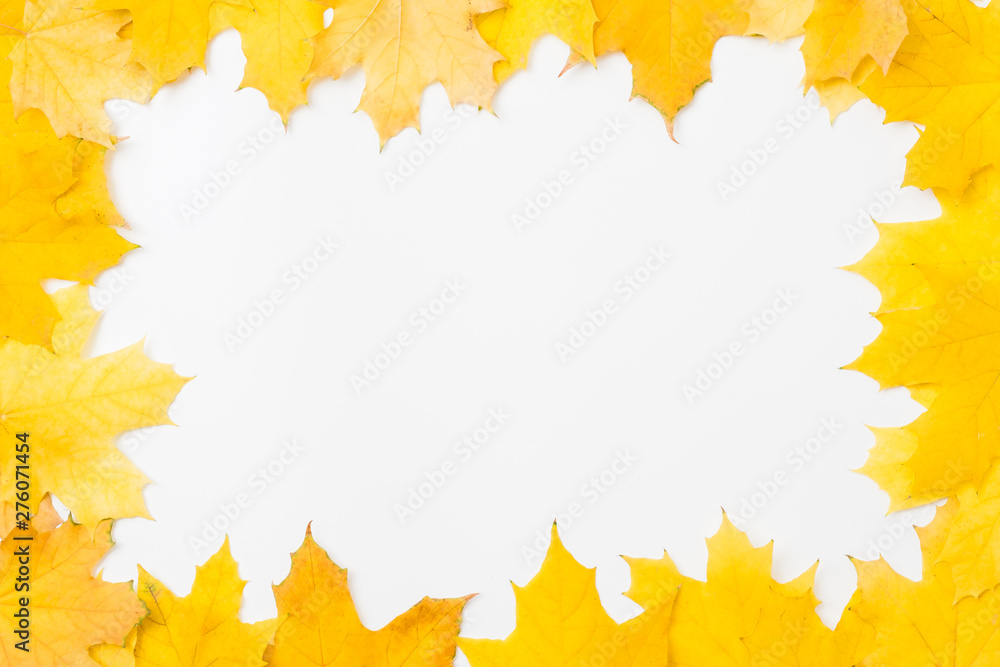 Autumn season abstract background. Fall yellow maple leaves arranged in square shape frame on white surface. Copy space. Autumn season abstract background. Fall yellow maple leaves arranged in square shape frame on white surface. Copy space.