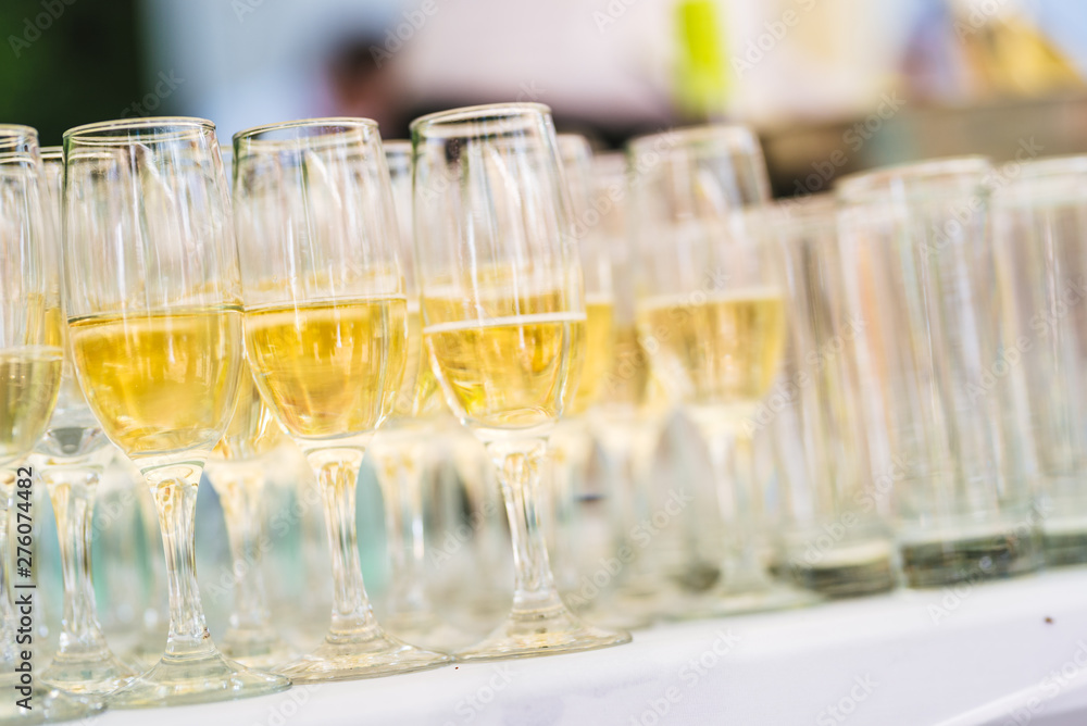 A cocktail party with champagne glasses A cocktail party with champagne glasses