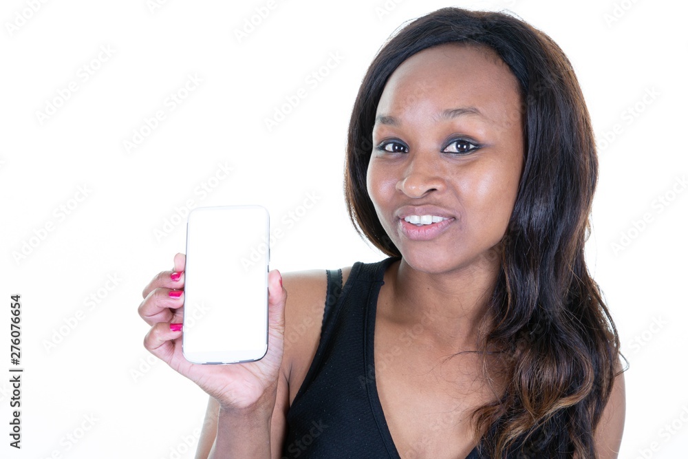 young woman with wavy hair holding cell smart phone with white copy space screen in white blank studio background young woman with wavy hair holding cell smart phone with white copy space screen in white blank studio background