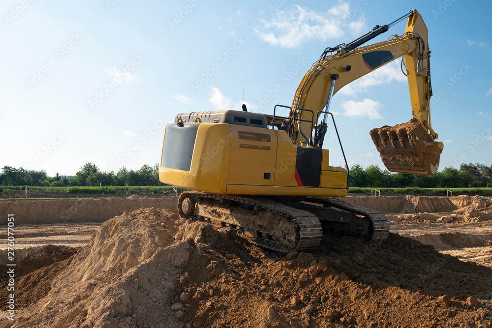 excavator on construction of new highway excavator on construction of new highway