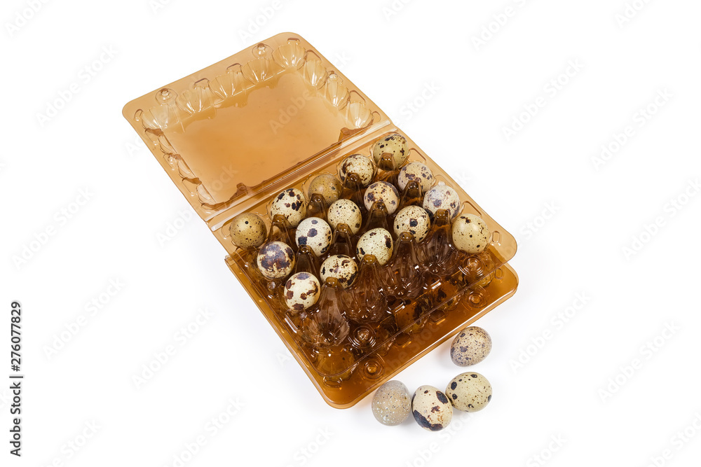 Top view of quail eggs in plastic packagings and beside Top view of quail eggs in plastic packagings and beside