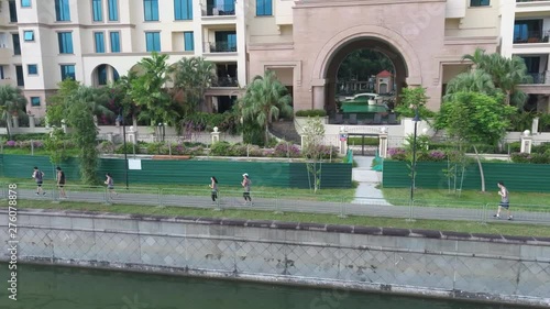Aerial drone shot of joggers in Singapore in the morning photo