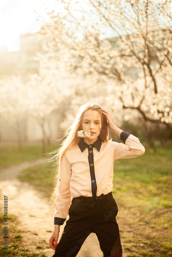 fotography of a girl in nature. Blooming trees. Apricots fotography of a girl in nature. Blooming trees. Apricots