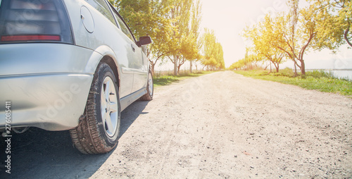 Car on road with sunlight. Transportation, Travel