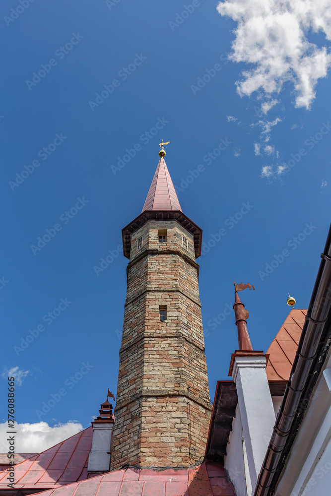 Obraz premium View of the tower of the Priory Palace of the Knights of the Order of Malta in a suburb of St. Petersburg, Russia