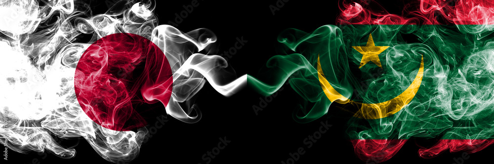 Fototapeta premium Japan vs Mauritania, Mauritanian smoky mystic flags placed side by side. Thick colored silky smokes combination of Mauritania, Mauritanian and Japanese flag