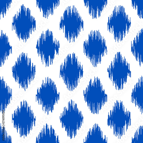 Uzbek ikat silk fabric pattern, indigo blue and white colors.