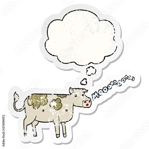 cartoon cow and thought bubble as a distressed worn sticker