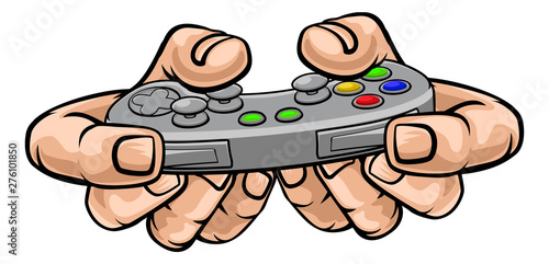 A gamer hand holding video gaming game controller