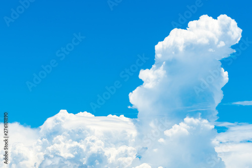 Beautiful blue sky and white cumulus clouds abstract background. Cloudscape background. Blue sky and fluffy white clouds on sunny day. Nature weather. Bright day sky for happy day background.