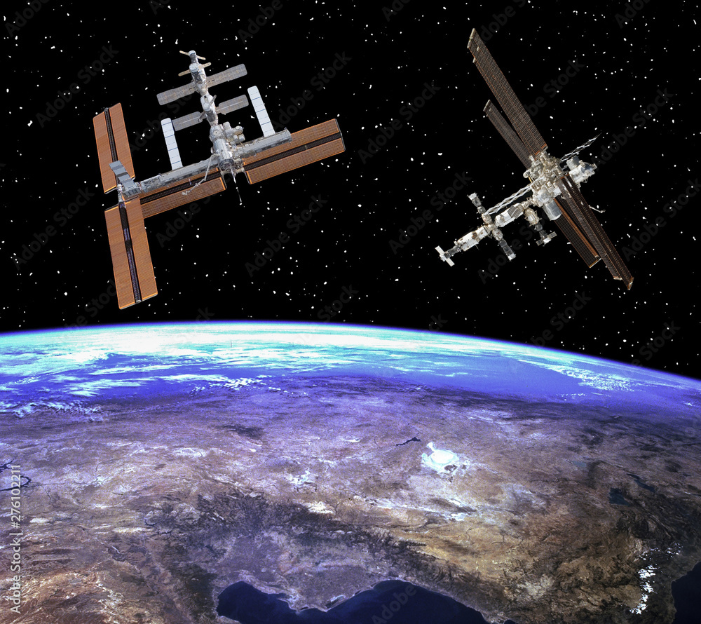 Space station. Spaceships above the earth. The elements of this image furnished by NASA. Space station. Spaceships above the earth. The elements of this image furnished by NASA.