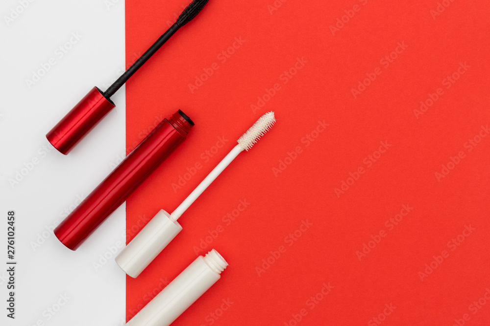 Open mascara on bright background Open mascara on bright background