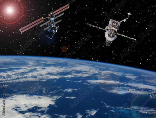Space station. Spaceships above the earth. The elements of this image furnished by NASA.