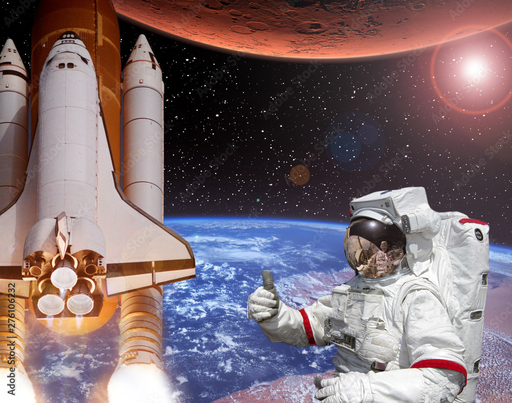 Rocket flies from earth to Mars. Astronaut shows the thumbs-up. Big sun. The elements of this image furnished by NASA. Rocket flies from earth to Mars. Astronaut shows the thumbs-up. Big sun. The elements of this image furnished by NASA.