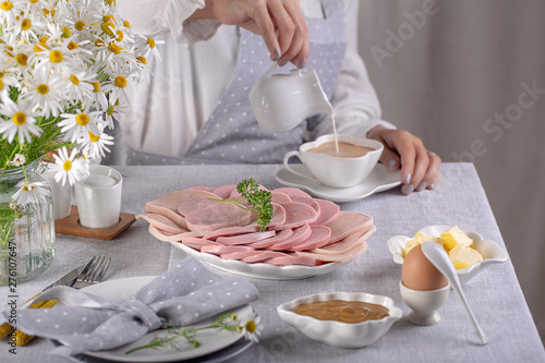 ham and sausage sliced ​​for breakfast on the table