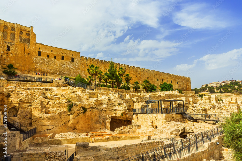 The fortress wall of ancient Jerusalem with the excavation of ancient buildings