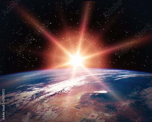 Fototapeta Naklejka Na Ścianę i Meble -  Amazing sunrise from space at night. The elements of this image furnished by NASA.