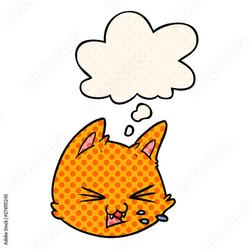spitting cartoon cat face and thought bubble in comic book style
