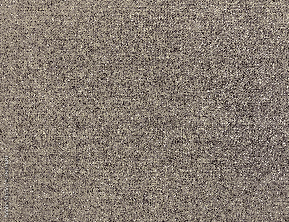 Fototapeta premium Textured background of brown natural textile 