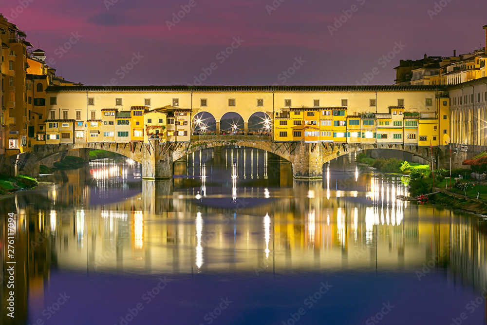 Florence. Old medieval bridge Ponte Vecchio at sunset.
