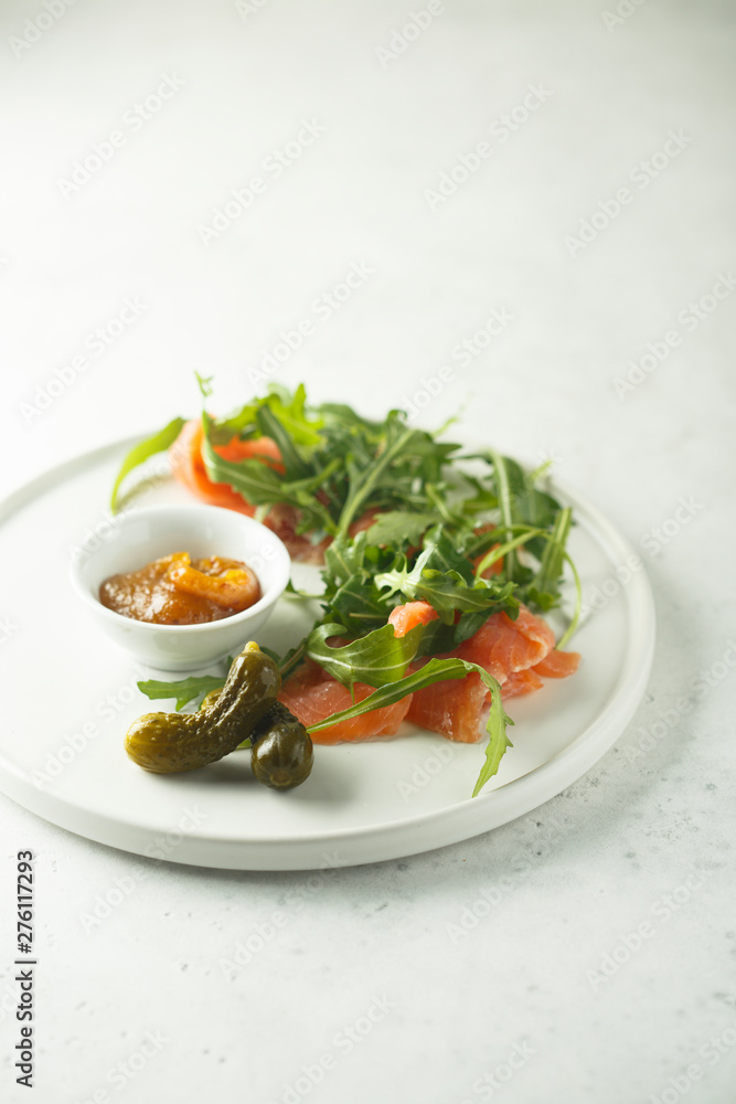 Smoked salmon arugula salad with pickles