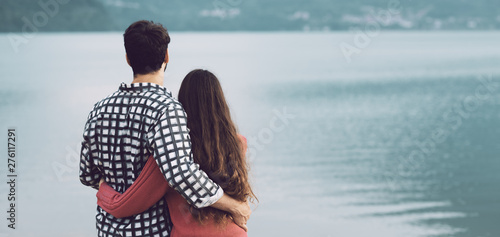 Romantic young couple hugging at the lake © StockPhotoPro