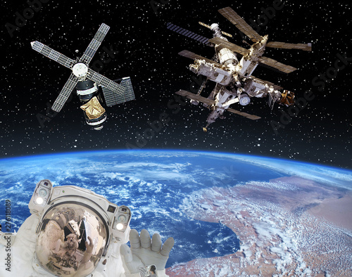 Astronaut and spaceships. The elements of this image furnished by NASA. © wowinside
