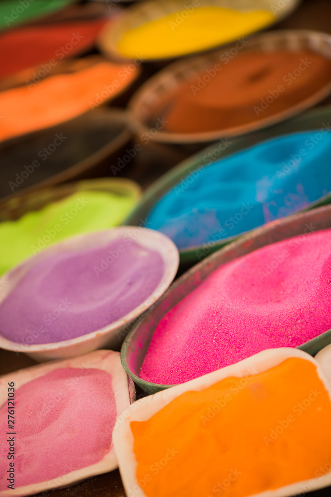 traditional egyptian multicolor sand in plates closeup background traditional egyptian multicolor sand in plates closeup background