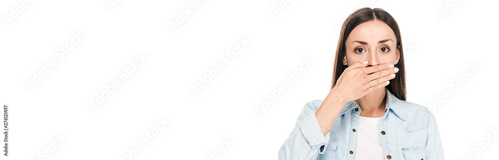 brunette woman covering mouth with hand isolated on white, panoramic shot brunette woman covering mouth with hand isolated on white, panoramic shot