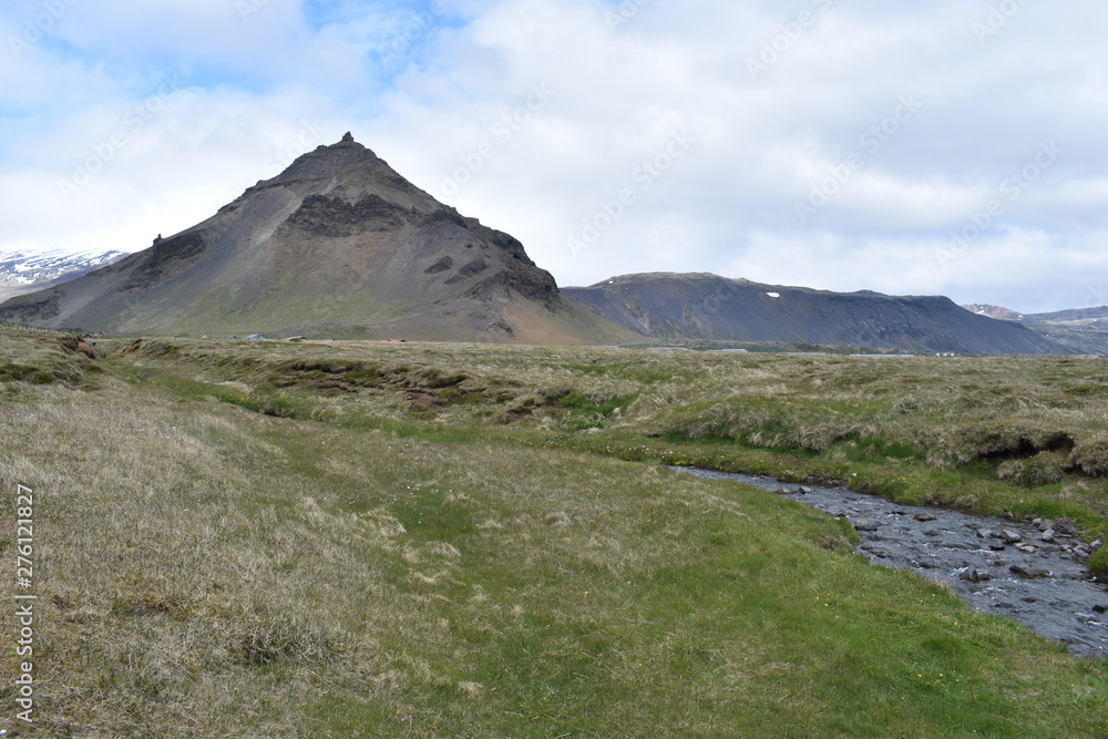 Hiking trail from Anarstapi to Hellnar with the raw nature in the west of Iceland at Snaefellsnes Peninsula