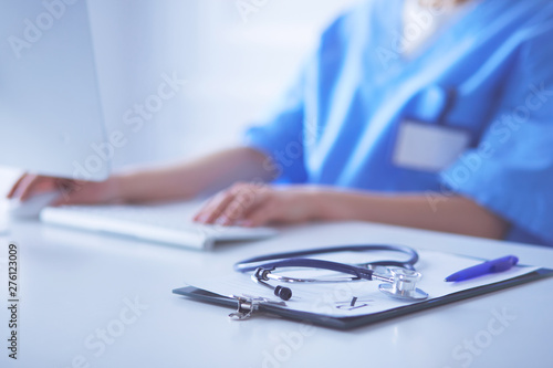Stethoscope on desk. Doctor working in hospital. Healthcare and medical concept
