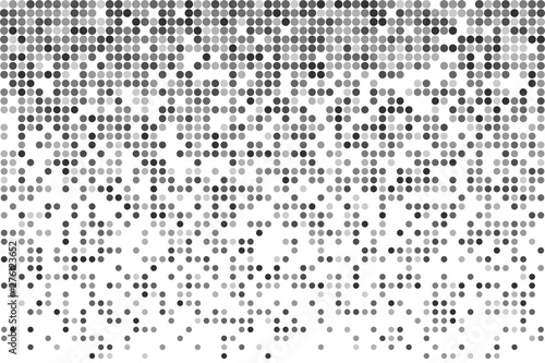 Halftone with chaotic pattern of gray dots on a white background