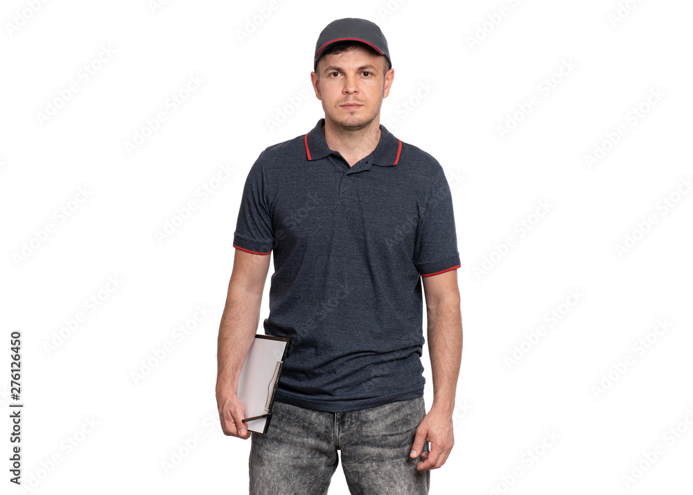Portrait of Delivery man in cap holding clipboard with papers document and pen. Handsome man looking on camera. Courier isolated on white background. Portrait of Delivery man in cap holding clipboard with papers document and pen. Handsome man looking on camera. Courier isolated on white background.