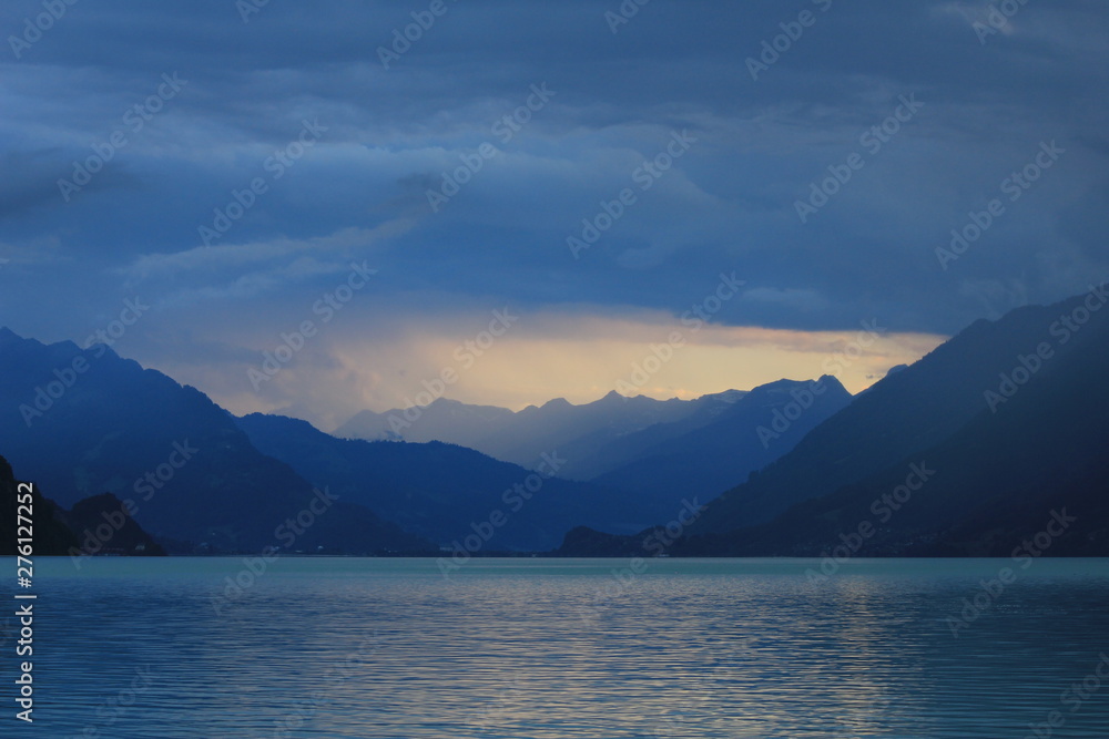 Sunset view from Brienz. Thunderstorm arriving over Interlaken, Switzerland.