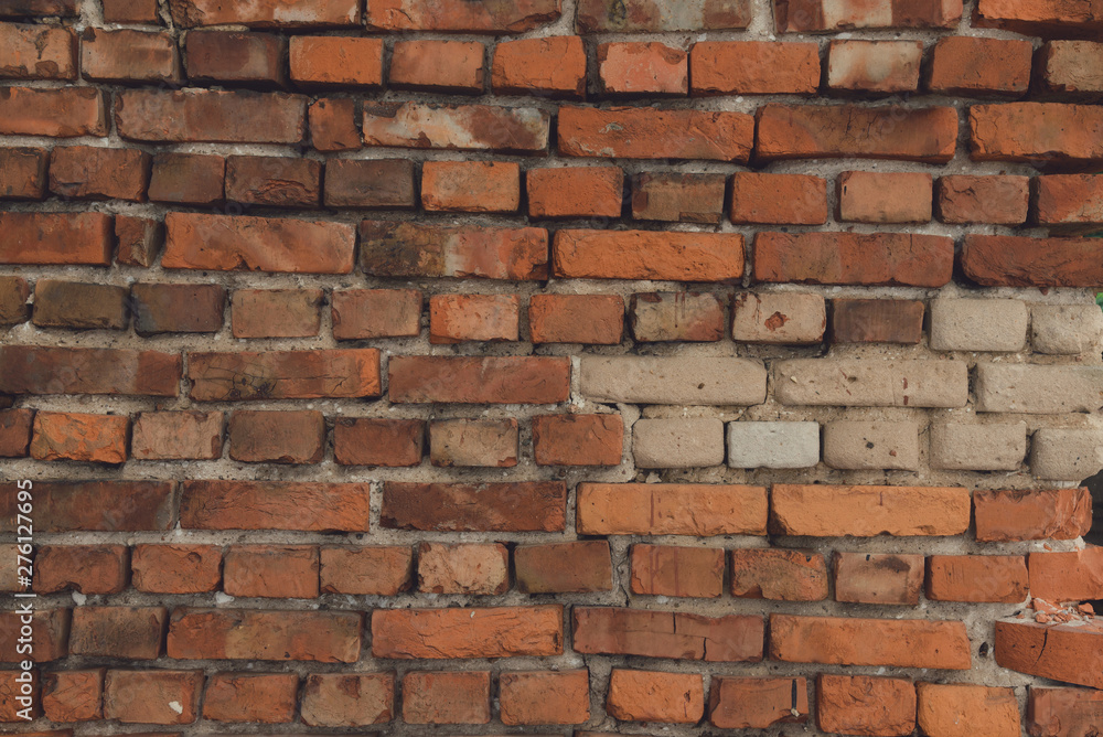 old wall of red and white dirty brick old wall of red and white dirty brick