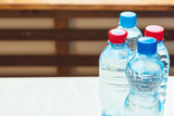 Full closed plastic water bottles. Close up