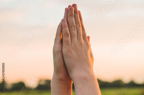 Foto Hands folded in prayer concept for faith, spirituality and religion