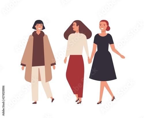 Group of pretty smiling women dressed in elegant clothes isolated on white background. Happy female friends walking together. Portrait of adorable stylish girls. Flat cartoon vector illustration.