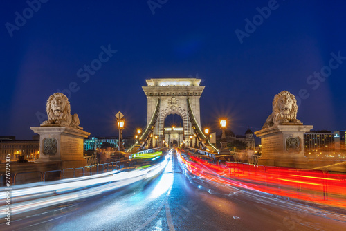 Facing Chain bridge at night with car light trails in Budapest, Hungary