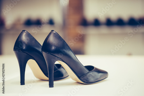 Shot of elegant expensive high heels women shoes in store