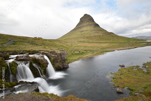 Famous kirkjufell mountain with the kirkjufell falls waterfalls in front in Grundarfj  dur in Iceland