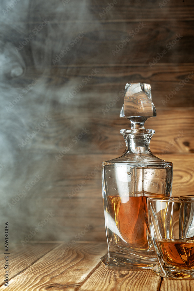 glasses with cognac, whiskey stand on the bar glasses with cognac, whiskey stand on the bar