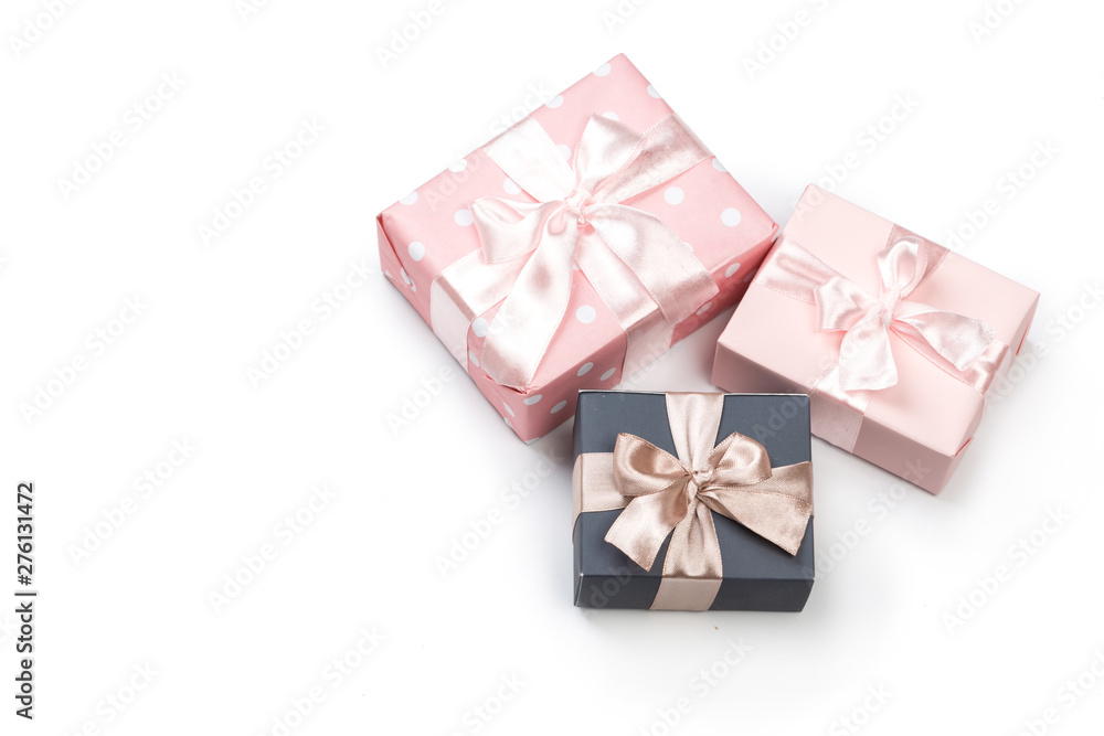 Luxury boxes tied with a pink and gold ribbon. Luxury boxes tied with a pink and gold ribbon.