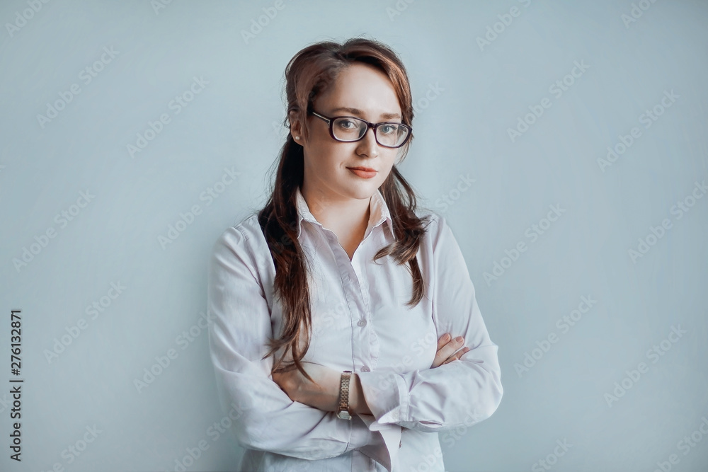 portrait of an Executive business woman on a gray background portrait of an Executive business woman on a gray background
