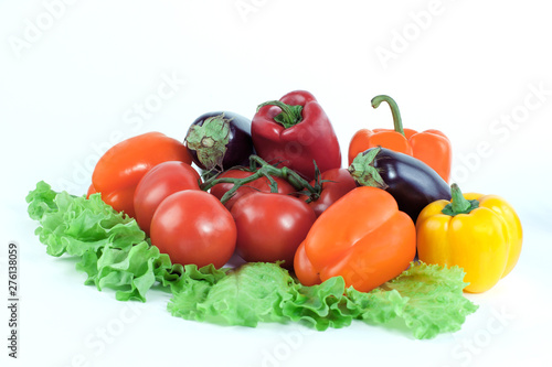 bell pepper,eggplant on lettuce leaves isolated on white