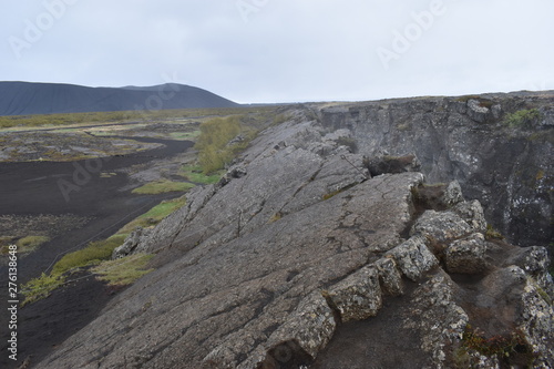 Landscape with many lava craters at grotto Grotagja Cave in Myvatn, Iceland  © places-4-you