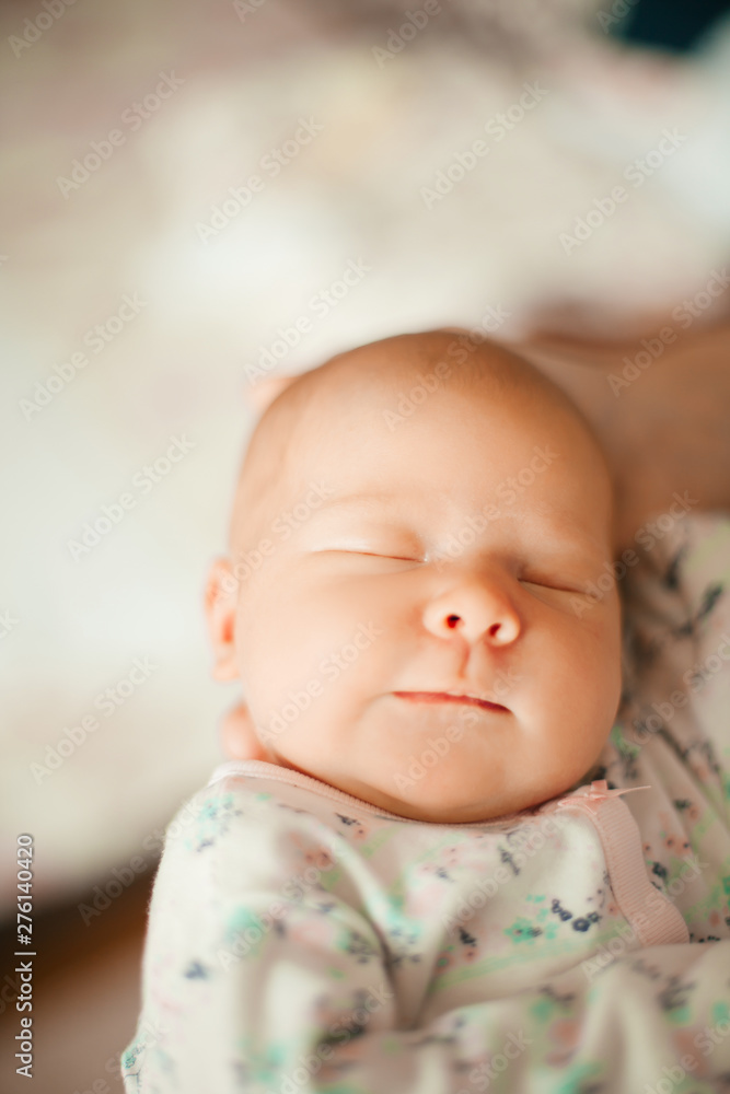 funny newborn baby sleeps in the arms of his mother funny newborn baby sleeps in the arms of his mother