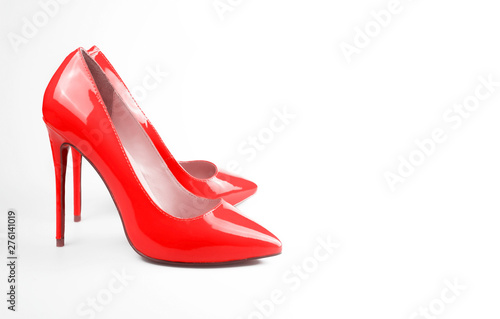 female red shoes on white background